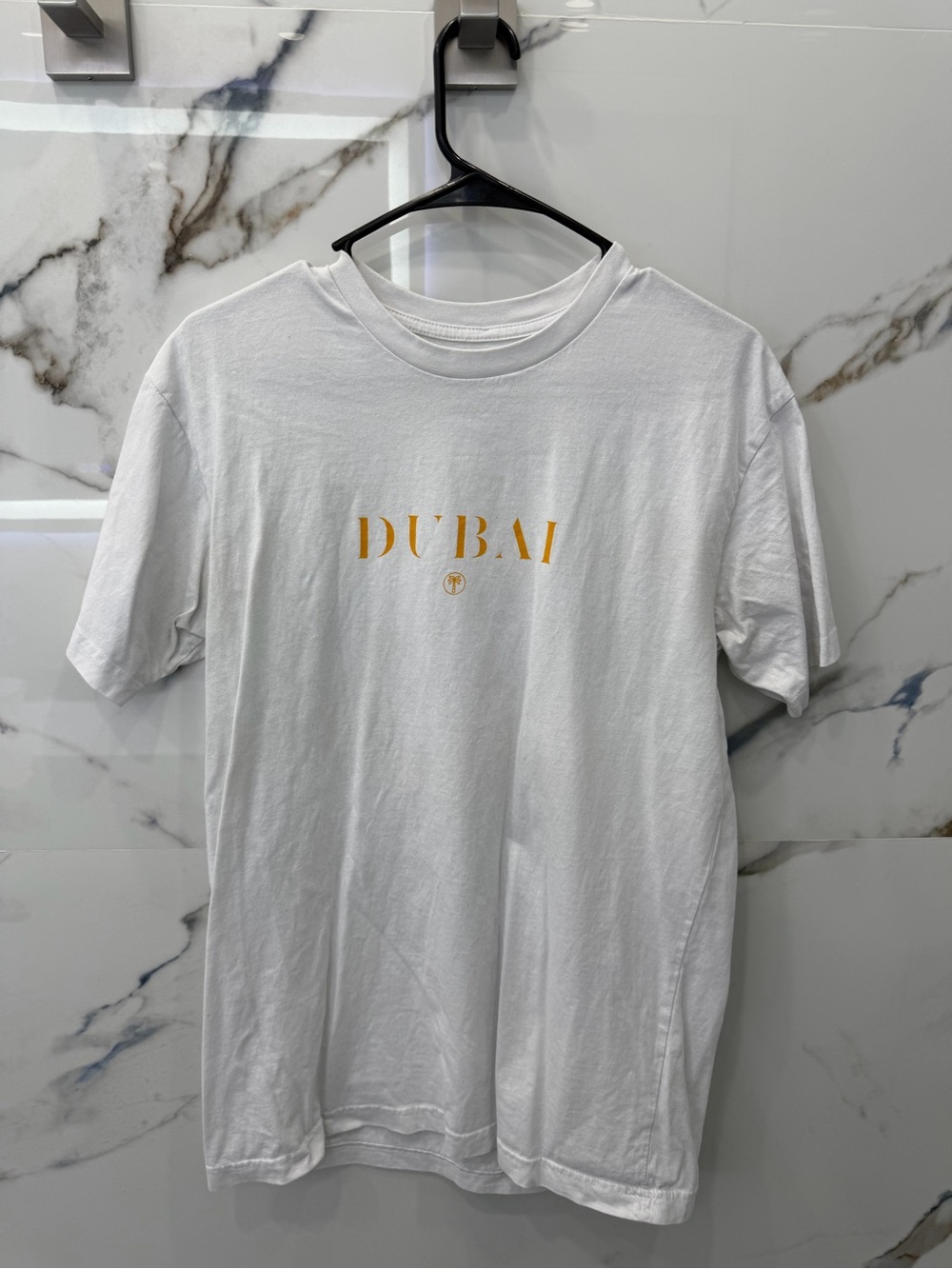 Fashion Nova White Tee with Gold Dubai Script